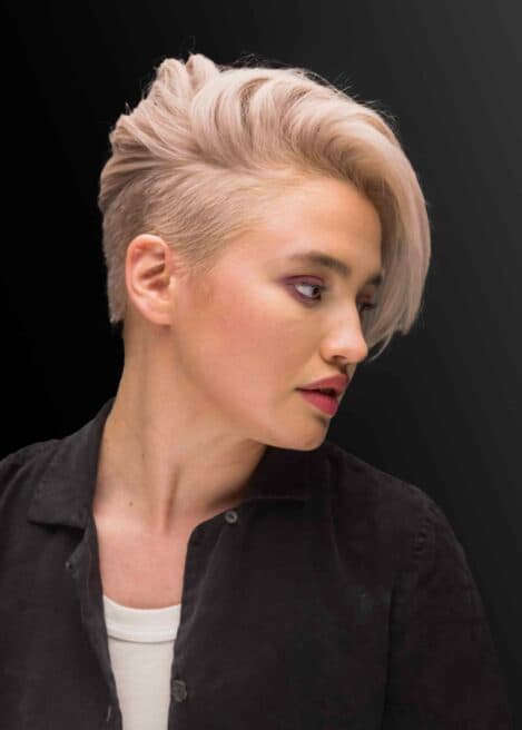 A woman with an Undercut Pixie hair style